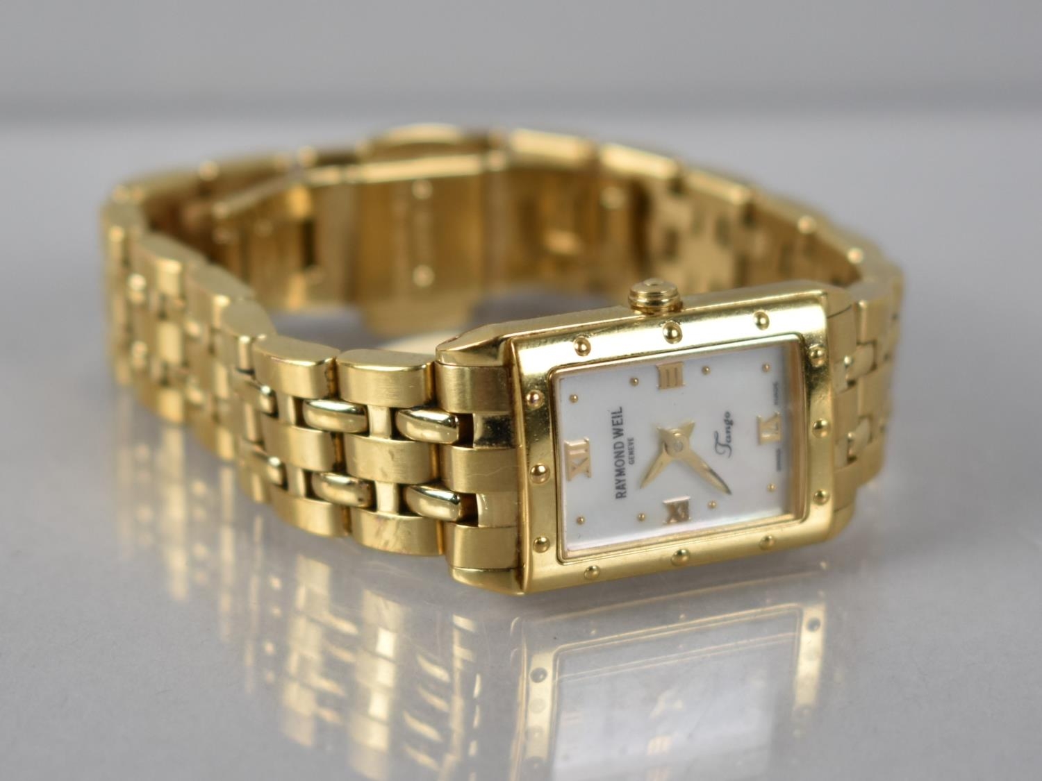A Raymond Weil Ladies Wristwatch, Tango Model, Mother of Pearl Face with Roman Numeral and Dot