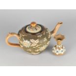 A Doulton of Lambeth Teapot Decorated in the Usual Enamels with Textured Surface Together with a