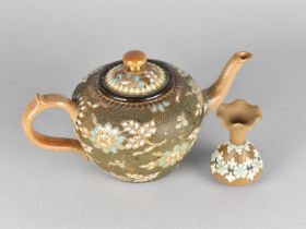 A Doulton of Lambeth Teapot Decorated in the Usual Enamels with Textured Surface Together with a