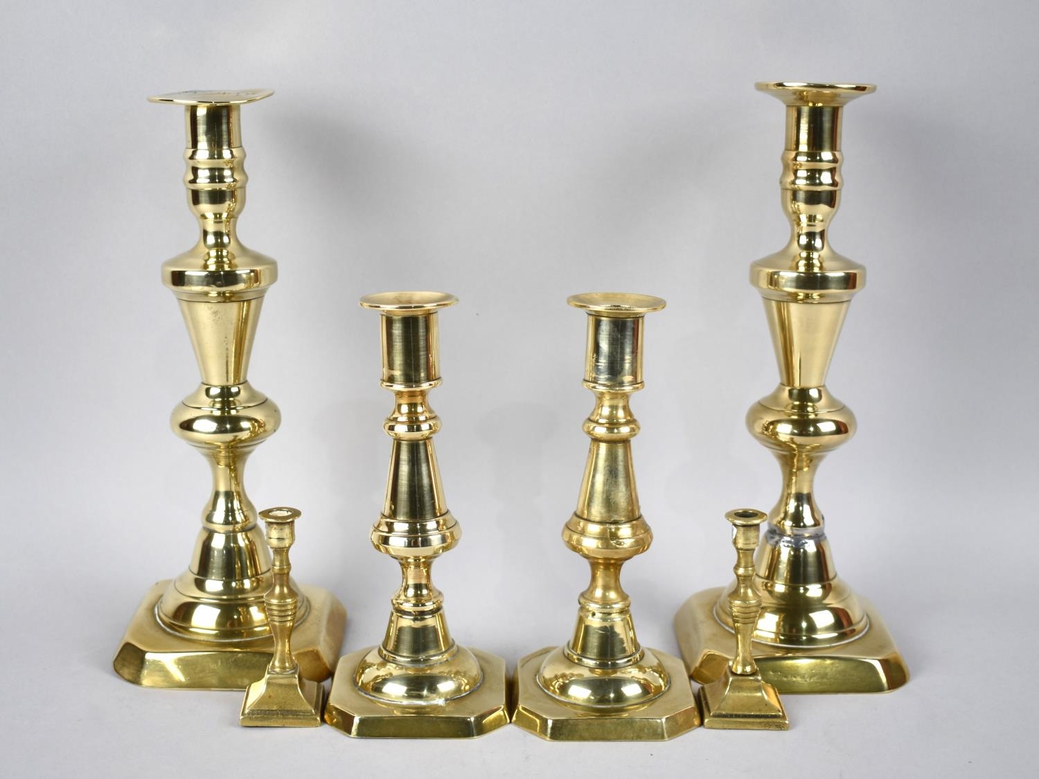 Three Pairs of Brass Candlesticks, Tallest 25cm High