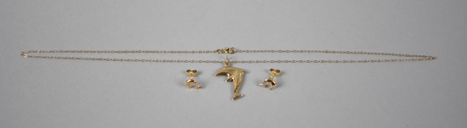 A Suite of 9ct Gold Jewellery, Dolphins, to include a pair of Earrings and Pendant on Chain, 0.8gms - Image 2 of 2