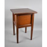 An Edwardian mahogany Lift Top Sewing Box, 36cms Square and 53cms High