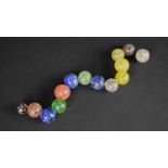 A Collection of Various 19th/20th Century Glass Marbles with Coloured Swirls