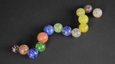 A Collection of Various 19th/20th Century Glass Marbles with Coloured Swirls