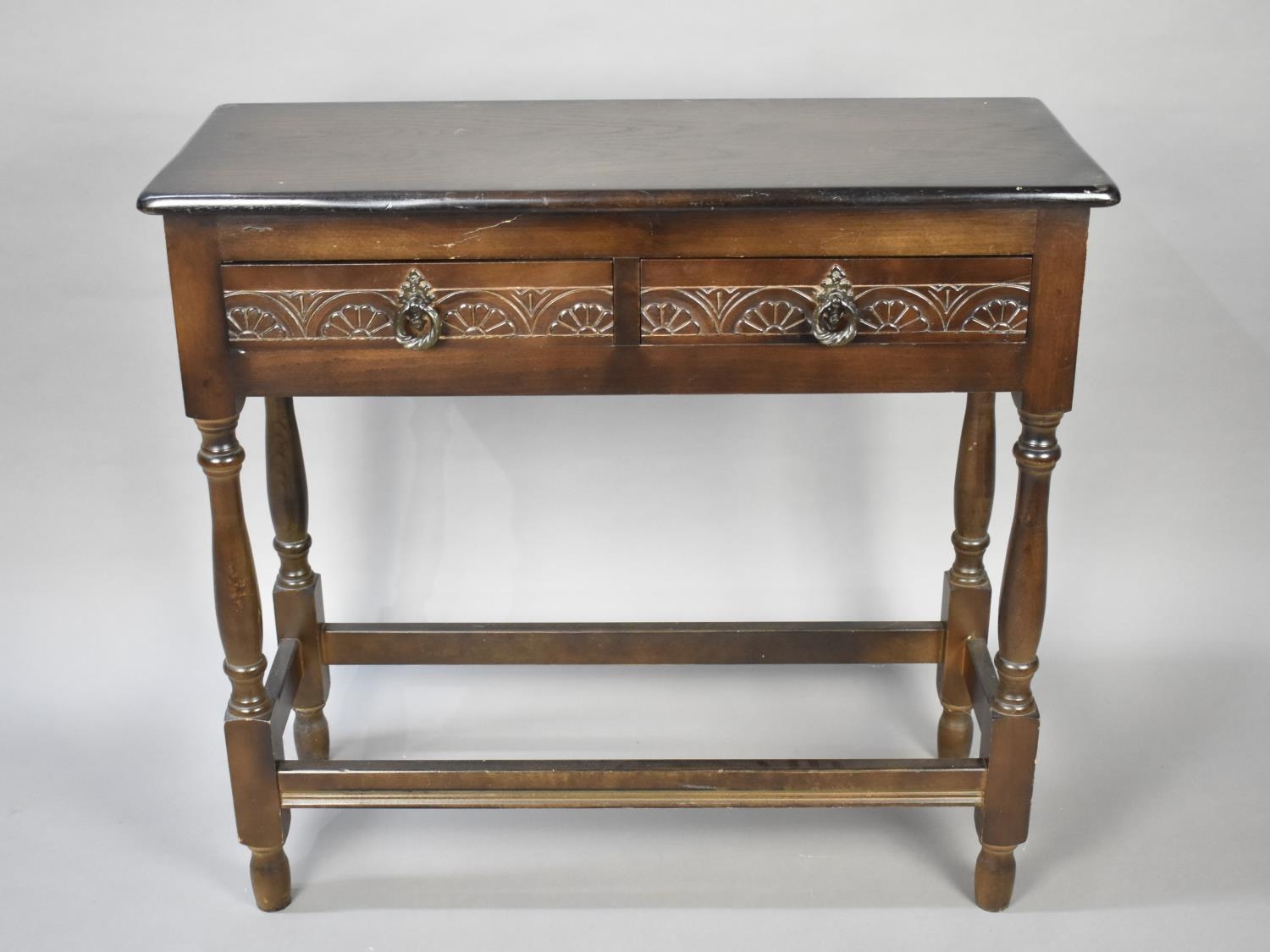 A Mid 20th Century Two Drawer Narrow Side Table on Turned Supports, 78cms Wide