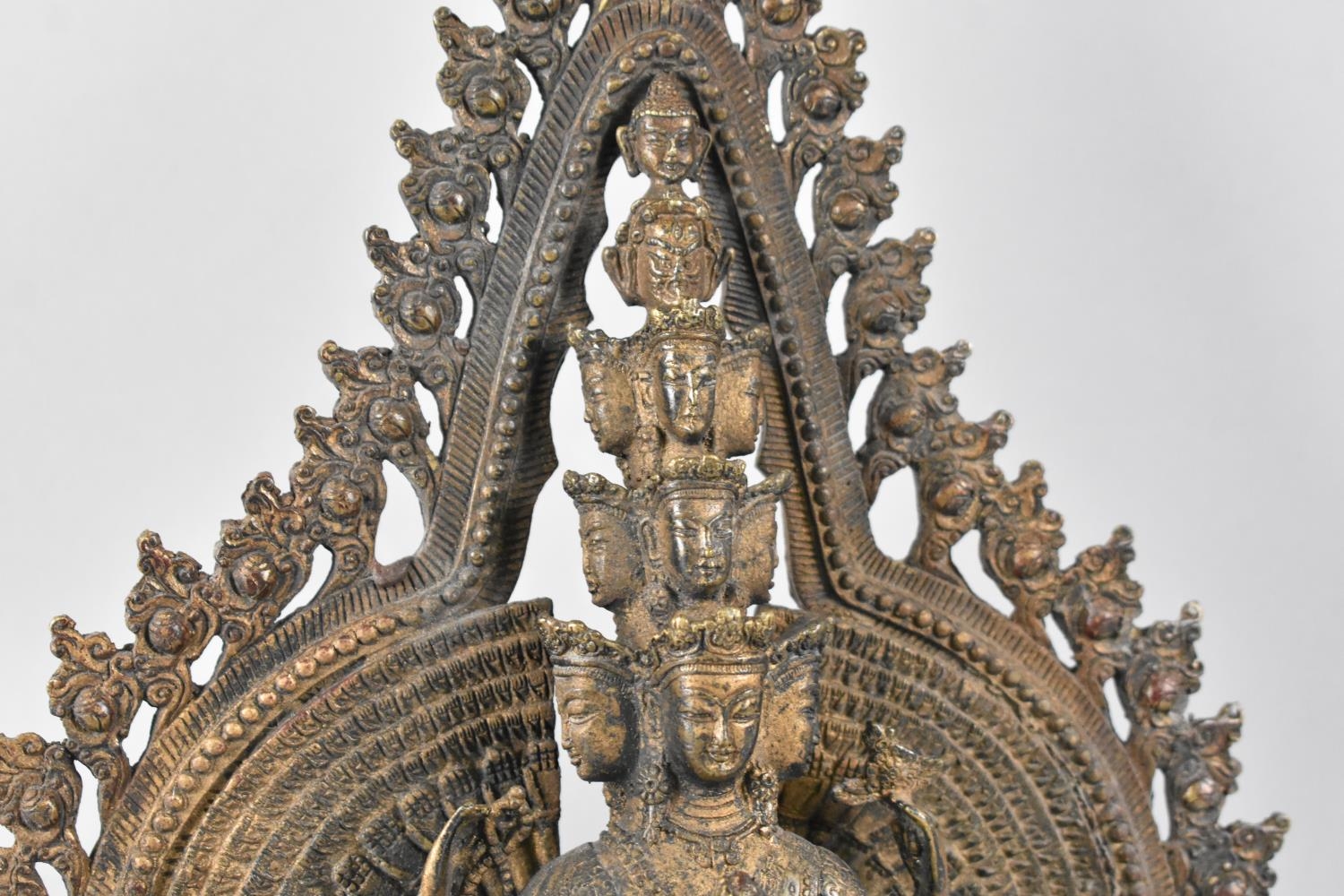 A Large Indian Patinated Bronze Temple Altar Piece Depicting Standing Deity with Many Heads and - Image 2 of 4