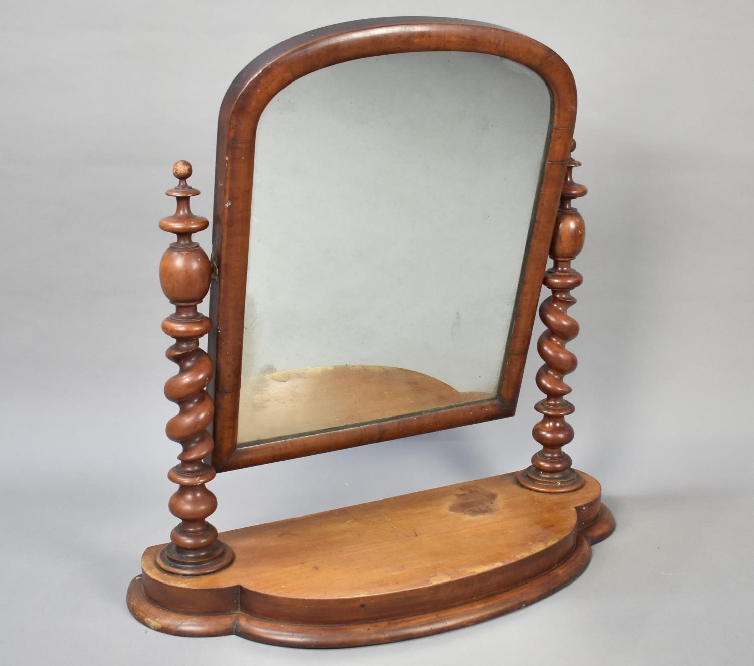 A Late Victorian Mahogany Swing Dressing Table Mirror with Barley Twist Supports and Serpentine