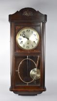 An Edwardian Oak Westminster Chime Wall Clock
