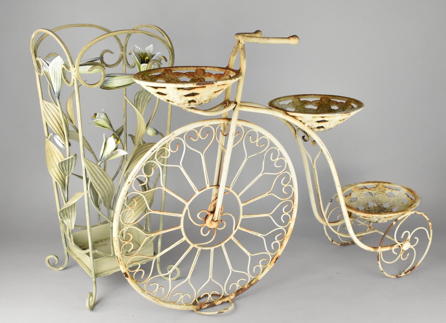 Two Wrought Metal Plant Stands the One Modelled as a Penny-farthing