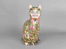 A Large Chinese Porcelain Study of a Seated Cat Decorated in the Famille Rose Palette, 36cm high