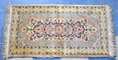 A Small Fringed Hearth Rug, 116x61cms