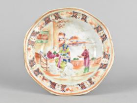 A Chinese Qing Dynasty Porcelain Dish Decorated in the Mandarin Palette Depicting Figures in