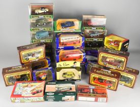 A Collection of Various Boxed Corgi Diecast Advertising Vehicles