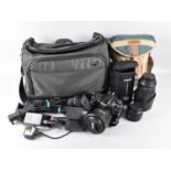 A Modern Camera Bag Containing Nikon D610 Digital Camera together with Three Nikon Lenses Etc