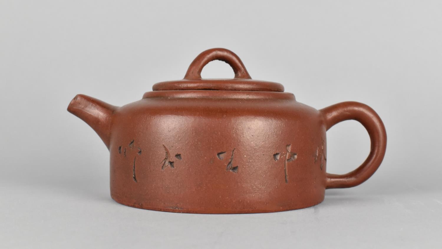 A Chinese Yixing Teapot with Incised Decoration to Body, Seal Mark to Base and Makers Marks to