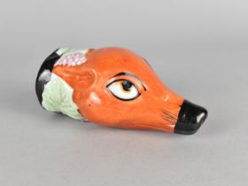 A Staffordshire Type Fox Mask Stirrup Cup, 12cm long