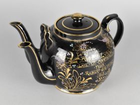 An Edwardian Black Glazed Twin Spout Marriage Teapot, Inscribed and Dated 1913