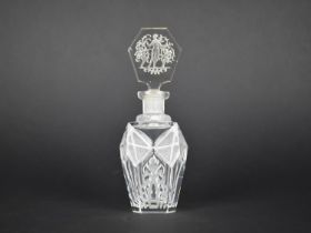 An Etched Glass Scent Bottle, Stopper Decorated with Classical Maidens and Cherubs, 16.5cms High