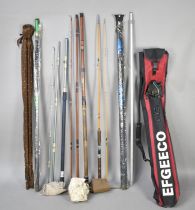 A Collection of Various Late 20th Century Fishing Rods in Canvas Carrying Bag