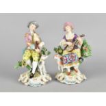 A Pair of 19th Century Derby Type Porcelain Figures, Modelled Seated the Gentleman Playing