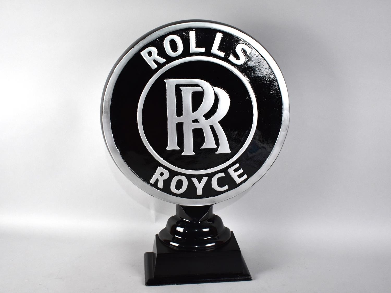 A Large Black Painted Aluminium Circular Rolls Royce Sign, 49cms High