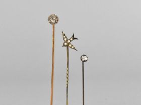 Three Tie Pins to include Split Pearl Mounted and Gilt Metal Example in the Form of a Swallow and
