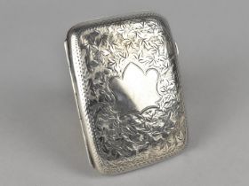 A Silver Cigarette Case with Foliate Engraved Decoration, by J.C Ltd Birmingham Hallmark, 6x9cm,