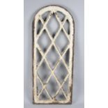 A 19th Century Cast Iron Arched Window Light Frame, 56cms High and 23.5cms Wide