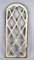 A 19th Century Cast Iron Arched Window Light Frame, 56cms High and 23.5cms Wide