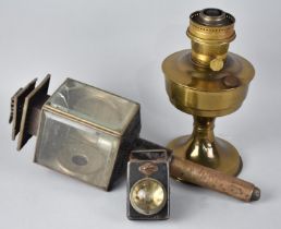 An Aladdin Brass Oil Lamp Base, a 19th Century Trap Lamp and a Vintage Bullseye Torch
