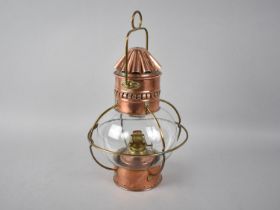 A Modern Copper and Brass Oil Lantern, 26cms High