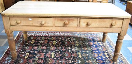 A 19th Century Stripped Pine Country House Pantry Table with Three Drawers and Turned Supports and