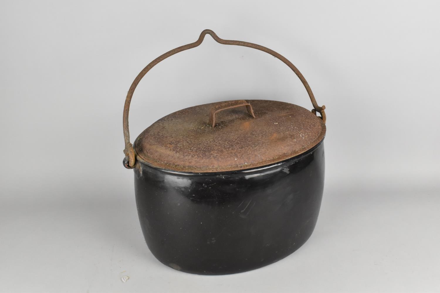 A Large Vintage Enamel Cooking Pot with Iron Loop Handle, 41cm wide