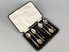 A Cased Set of Six Silver Teaspoons and a Pair of Sugar Tongs, Sheffield Hallmark