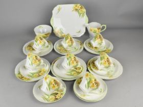 A Shelley Daffodil Pattern Tea Set (Pattern no. 13670) to Comprise Eight Cups, Nine Saucers, Six