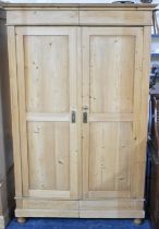 A Stripped Pine Double Wardrobe, 127cms Wide