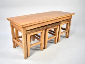 A 1970's Nest of Four Tables, Top Cover Removes to Reveal Rush Top, 99cms Wide