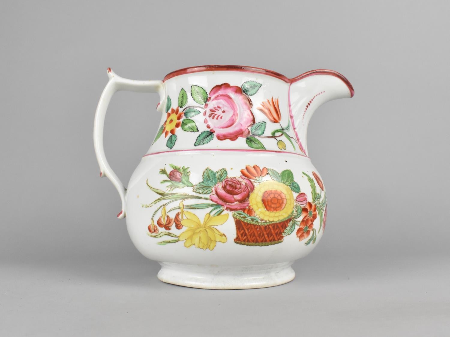 A 19th Century English Pottery Jug Hand Painted with Basket of Flowers Decoration, 18.5cm high (Some