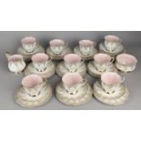 A Pink, White and Gilt Trim Decorated Tea Set to Comprise Ten Cups, Saucers, Side Plates, Milk Jug