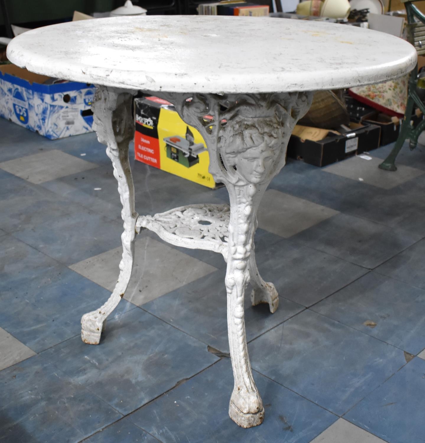 A White Painted Cast Iron Britannia Pub Table, 75cm diameter