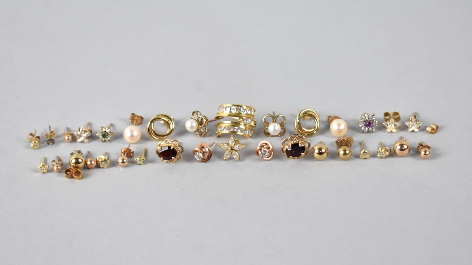 A Collection of 9ct Gold and Yellow Metal Earrings to include Garnet Mounted Pair, Pearl Mounted