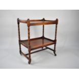 A Mid 20th Century Oak Two Tier Galleried Trolley with Bobbin Supports, 61cms Wide