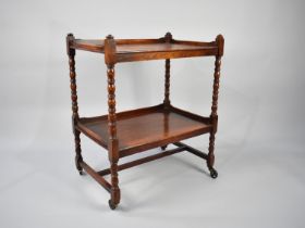 A Mid 20th Century Oak Two Tier Galleried Trolley with Bobbin Supports, 61cms Wide