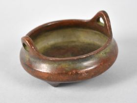A Chinese Patinated Bronze Two Handled Censer on Three Feet and with Seal Mark to Base, 9cms