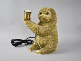 A Modern Gilt Sprayed Novelty Table Lamp in the Form of a Sloth, 29cms High