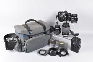 A Camera Bag containing Olympus OM-2 35mm Camera, Various Lenses and Accessories Flashgun Etc