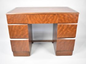 A Modern Kneehole Writing Desk with Tooled Leather Top and Three Drawers Either Side Centre