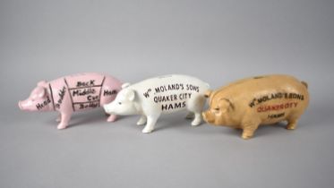 A Collection of Three Cold Painted Cast Metal Novelty Money Boxes in the Form of Pigs, 19cms Long,