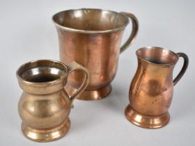 A Collection of Three Vintage Metal Measures