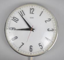 A Mid 20th Century Metamec Wall Hanging Circular Clock with Electric Movement, 20cms Diameter